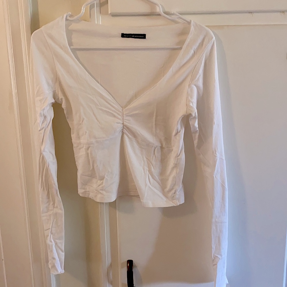 White long sleeve top.